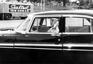 Harry Truman takes Chrysler out for an ice cream cone