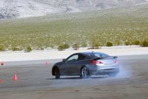A drift in the 2010 Hyundai Genesis Coupe.  The rear-drive layout provides an unexpected degree of control.
