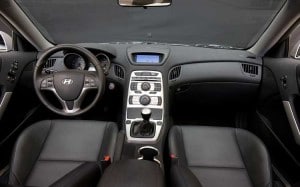 A generally upscale interior, with a driver-oriented cockpit design, but a few cheap touches, such as the high-mounted display screen.