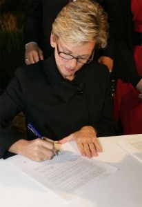 Michigan Governor Jennifer Granholm signs new legislation authorizing million in tax credits to draw advanced battery production facilities to the state.