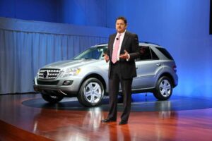 Mercedes' U.S. boss, Ernst Lieb, reveals the automaker's first hybrid-electric vehicle, the ML450.