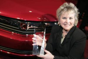 Saturn General Manager Jill Lajdziak accepts the award for the midsize Aura, named North American Car of the Year at the 2007 Detroit Auto Show.