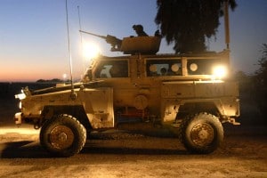 Dawn patrol leaving Camp Striker in Baghdad, Irag to clear a route.