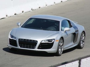 The 2010 Audi R8 V10 features a track-ready magnetic ride suspension. The engine is derived from Audi's GT3 LMS race car.