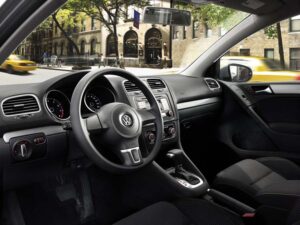 The 2010 Volkswagen Golf's interior is simple but well-appointed, with far less hard plastic than the prior model.