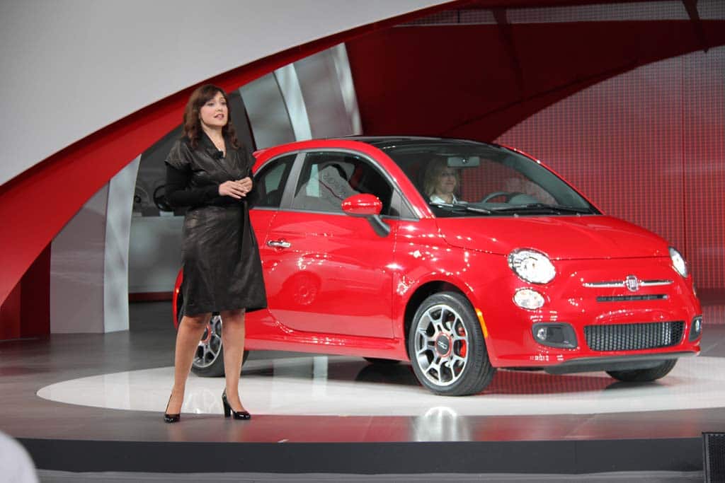 Laura Soave head of the Fiat brand in North America stands with the new