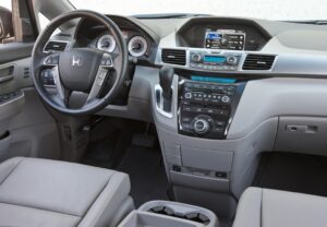 The Odyssey's instrument panel features metal-look trim rings inside the gauges that matches the trim on the dashboard.