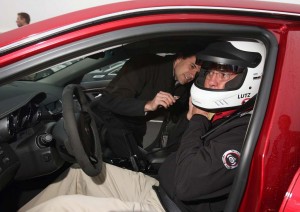 Senior Bigone, aka Bob Lutz, buckles up for the CTSv Challenge at Monticello Motor Club.