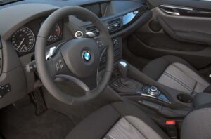 The interior of the 2010 BMW X1 features a bit more hard plastic than other SAV models, reflecting the need to hold down costs.