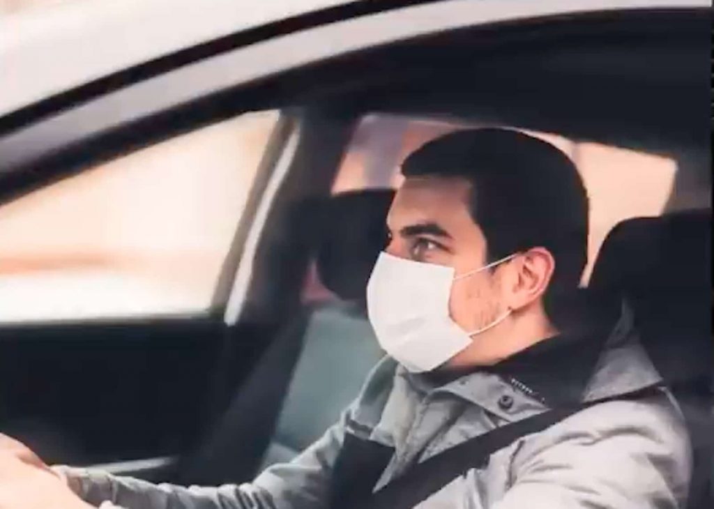 Uber driver with mask