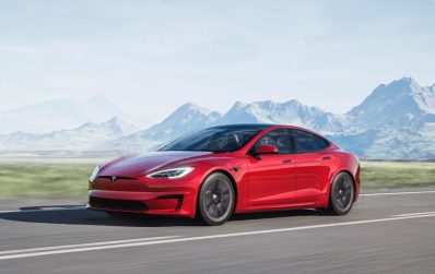 2021 Tesla Model S driving red