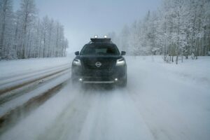 2022 Nissan Pathfinder nose driving snowstorm