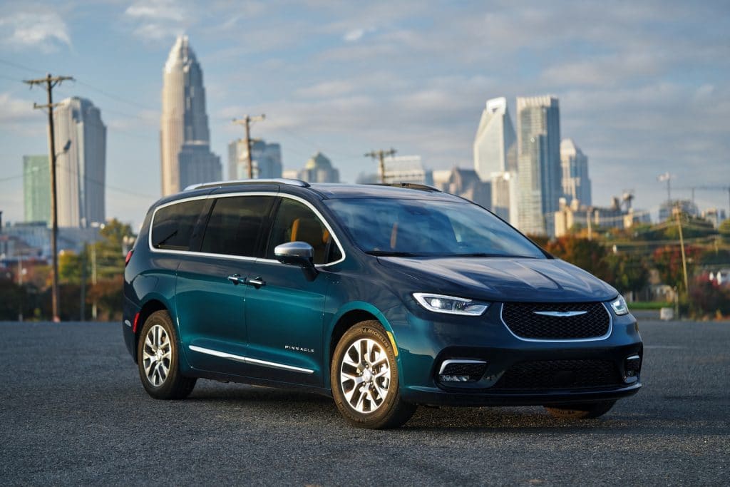 2021 Chrysler Pacifica Pinnacle Hybrid, shown in Fathom Blue. Fathom Blue is a new exterior color option for the 2021 model year.