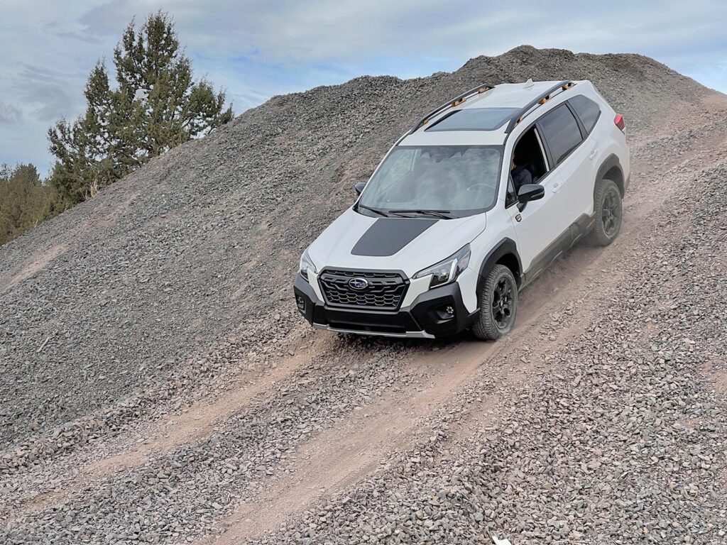 2022 Subaru Forester Wilderness - descending gravel hill white