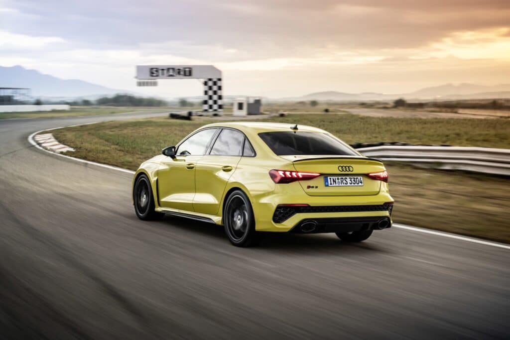 2022 Audi RS 3 track driving rear yellow