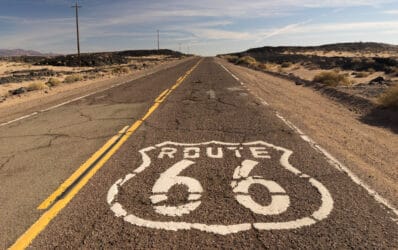 Rural Route 66 Two Lane Historic Highway Cracked Asphalt