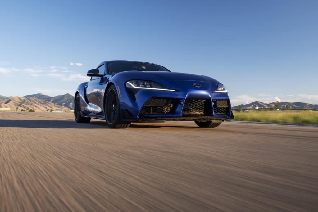 2023 Toyota GR Supra MT front driving low REL