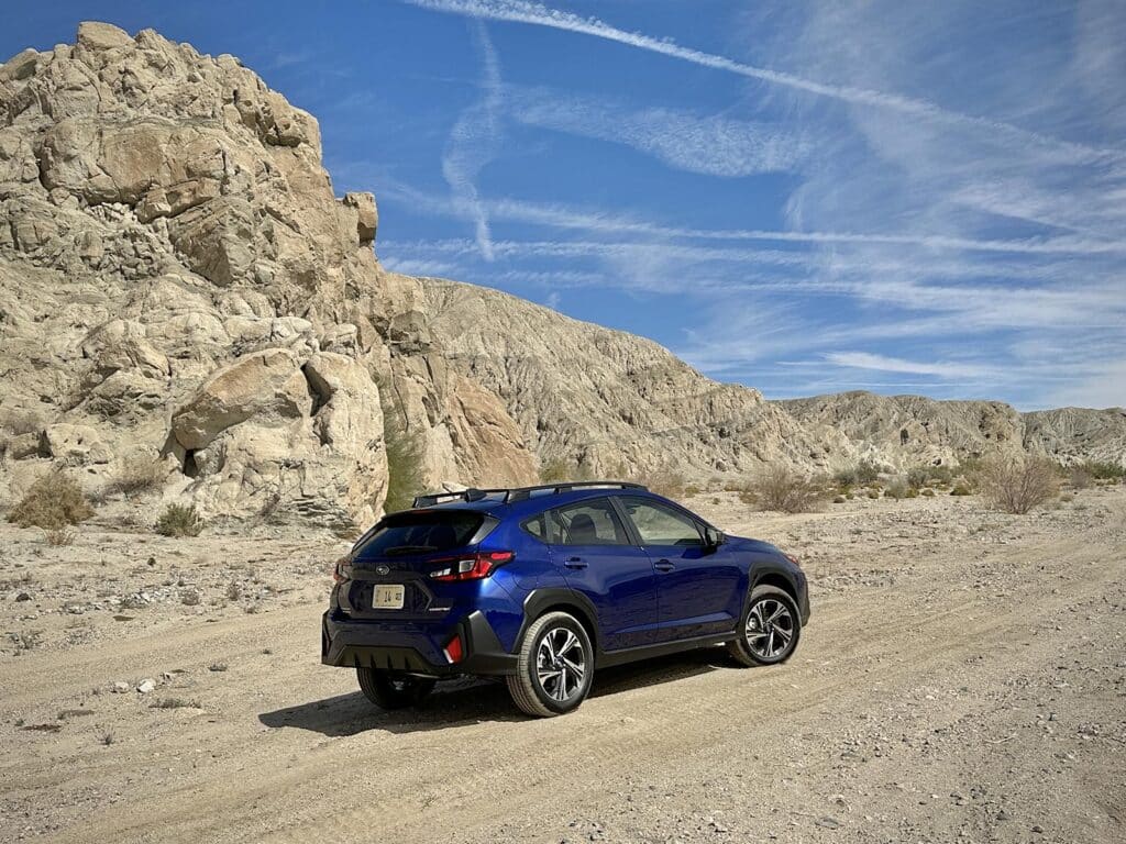2024 Subaru Crosstrek - sky and rocks rear 3-4 Beauty Shot